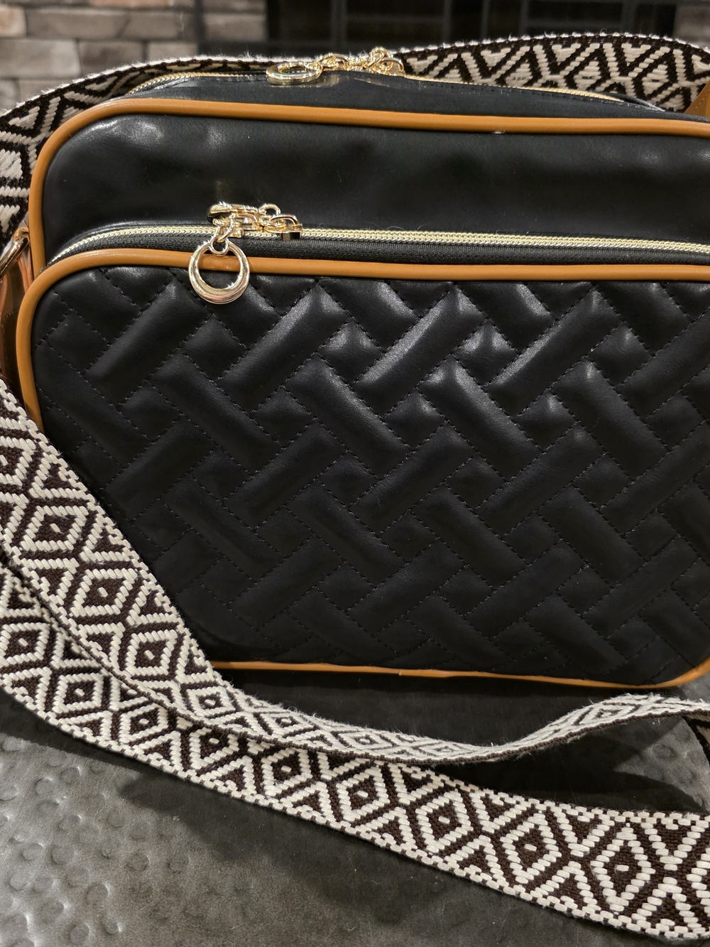 Quilted Black Crossbody Book Bag with Tan Trim and Patterned Strap